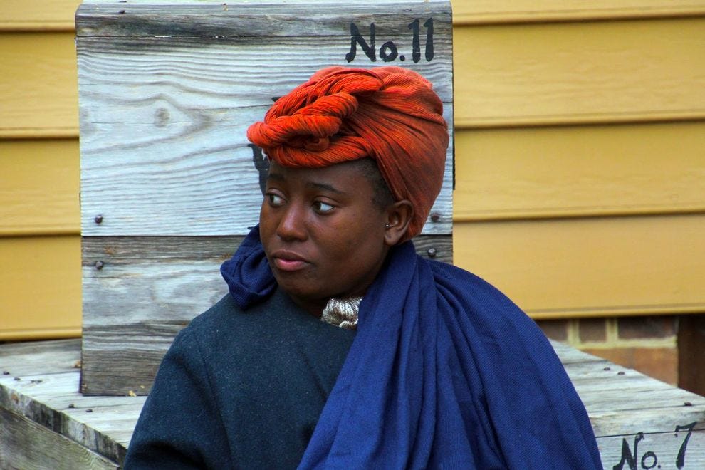 Femme noire faisant partie de la distribution d'acteurs de Williamsburg