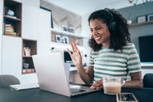 Woman using laptop at home