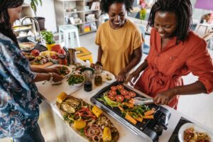 Women making food together