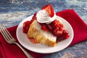 The trinity of cake, strawberries and whipped cream come together in this classic dessert