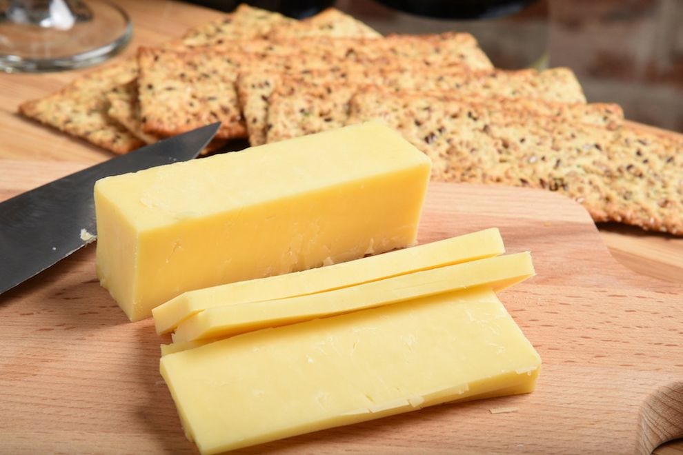 Tranches épaisses de fromage cheddar blanc