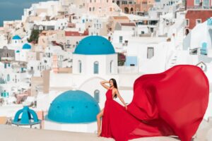 Santorini provides the perfect backdrop for a flying dress photo shoot