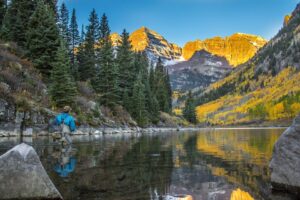 Fly fishing on Maroon Lake offers scenic views of Maroon Bells