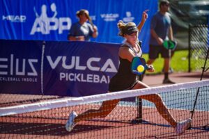 Pro player Corrine Carr competing in a pickleball tournament
