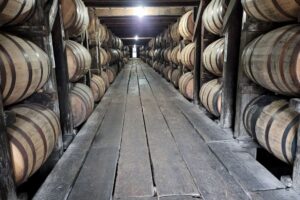 Kentucky bourbon aging in white oak barrels