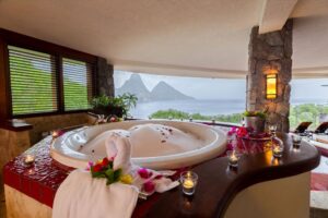 Mounted on a pedestal with commanding views of the majestic Pitons, whirlpool tubs are the main attraction in the extravagant suites at Jade Mountain